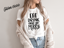 Load image into Gallery viewer, Eat Drink and Be Merry Christmas Shirt, White Holiday T-Shirt, Christmas Party Tee, Festive Xmas Shirt, Holiday Graphic Tee, Christmas Gift