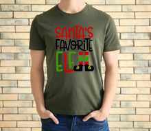 Load image into Gallery viewer, Santa's Favorite Elf tshirt, Christmas shirt, Family Matching Christmas tshirts, Elf lover, Christmas gifts, Unisex, Adult and youth sizes