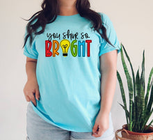 Load image into Gallery viewer, You Shine So Bright tshirt, Teacher's shirt, Teacher Life t shirt, Motivating tee.