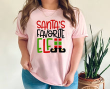 Load image into Gallery viewer, Santa's Favorite Elf tshirt, Christmas shirt, Family Matching Christmas tshirts, Elf lover, Christmas gifts, Unisex, Adult and youth sizes