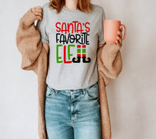 Load image into Gallery viewer, Santa's Favorite Elf tshirt, Christmas shirt, Family Matching Christmas tshirts, Elf lover, Christmas gifts, Unisex, Adult and youth sizes