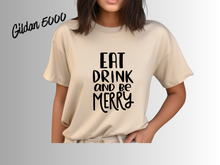 Load image into Gallery viewer, Eat Drink and Be Merry Christmas Shirt, White Holiday T-Shirt, Christmas Party Tee, Festive Xmas Shirt, Holiday Graphic Tee, Christmas Gift
