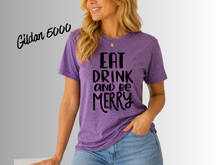 Load image into Gallery viewer, Eat Drink and Be Merry Christmas Shirt, White Holiday T-Shirt, Christmas Party Tee, Festive Xmas Shirt, Holiday Graphic Tee, Christmas Gift
