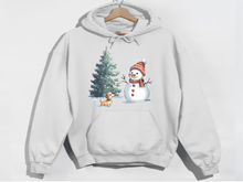 Load image into Gallery viewer, Christmas Snowman Hooded Sweatshirt | Snowman gift | Funny Snowman | Melting Snowman | Nature Lover | Novelty Apparel | Unisex Hoodie
