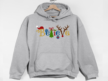 Load image into Gallery viewer, Believe Christmas Hooded Sweatshirt, Santa t shirt, Christmas tshirts, Family tshirts.
