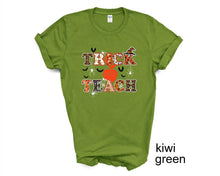 Load image into Gallery viewer, Trick or Teach tshirt, Teacher&#39;s Halloween shirt, Gifts, Teacher&#39;s t-shirt, Funny Halloween shirt, Unisex, More colors available
