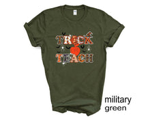 Load image into Gallery viewer, Trick or Teach tshirt, Teacher&#39;s Halloween shirt, Gifts, Teacher&#39;s t-shirt, Funny Halloween shirt, Unisex, More colors available
